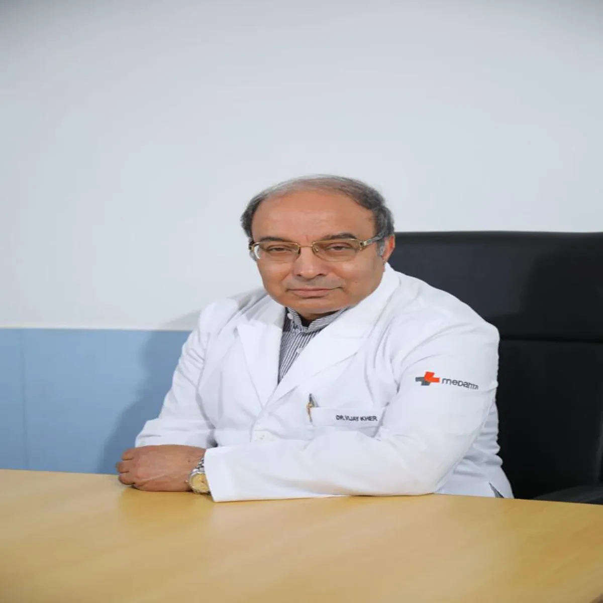 Dr. Vijay Kher